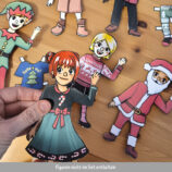 Anziehpuppe mit Weihnachtskleidung